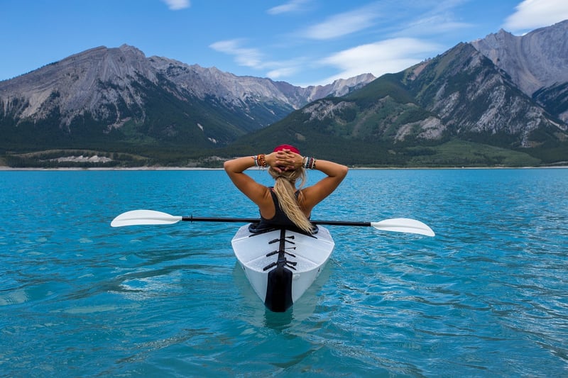 Person kayaking on a lake